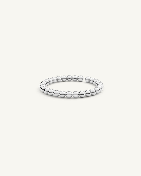 A Ring in polished Silver plated-316L stainless steel from Waldor & Co. The model is Petite Ring Polished.