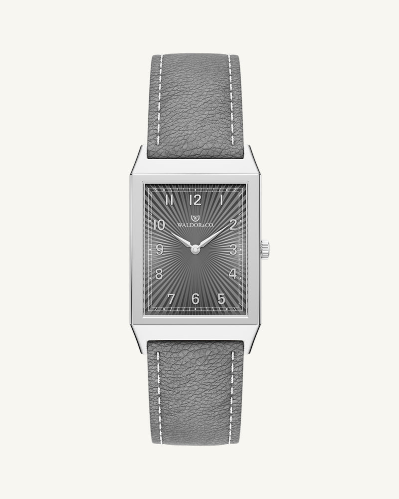 A square mens watch in Rhodium-plated 316L stainless steel from Waldor & Co. with grey guilloche dial. Miyota movement. Leather strap. The model is Conceptual 37 Cap Ferrat.